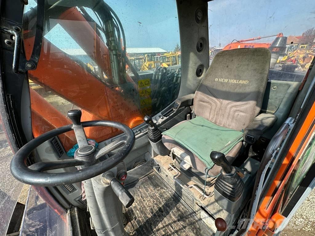 New Holland MH Plus Колісні екскаватори