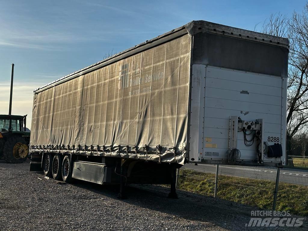 Schmitz SCS 24 L Тентовані причепи