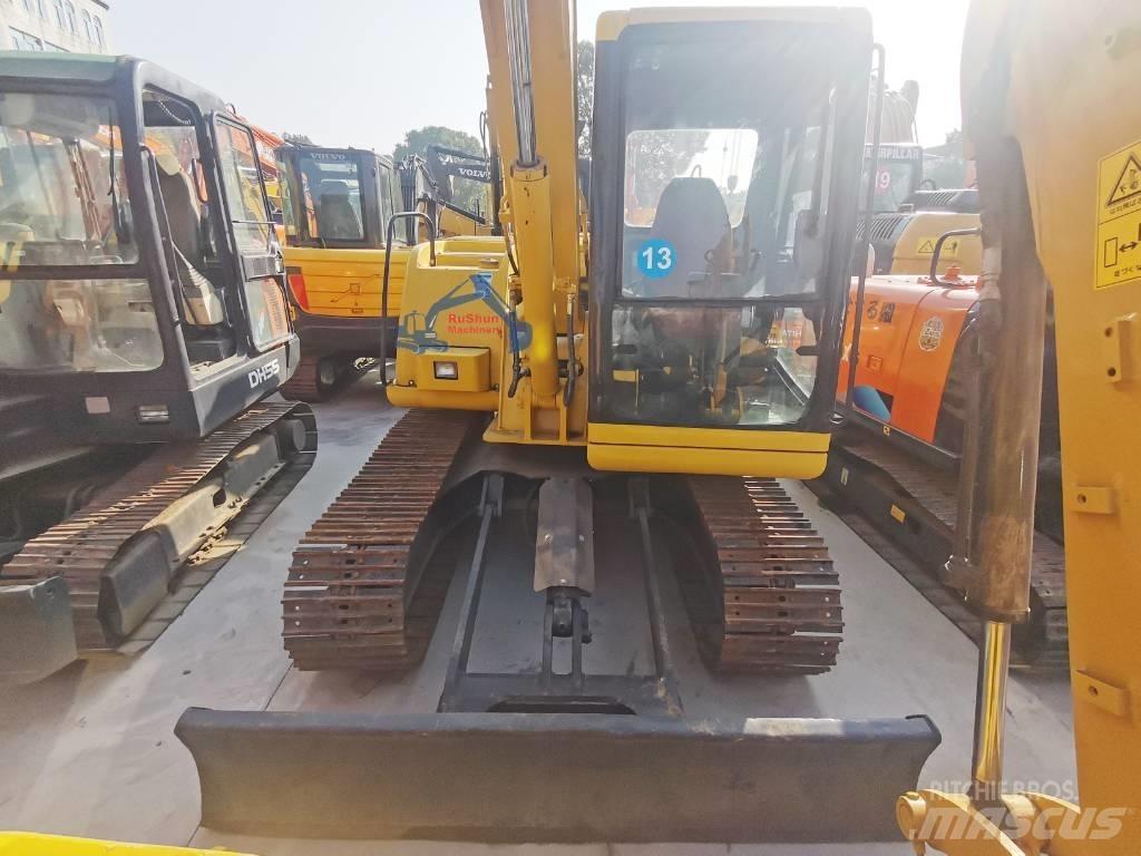 Komatsu PC60 Міні-екскаватори < 7т