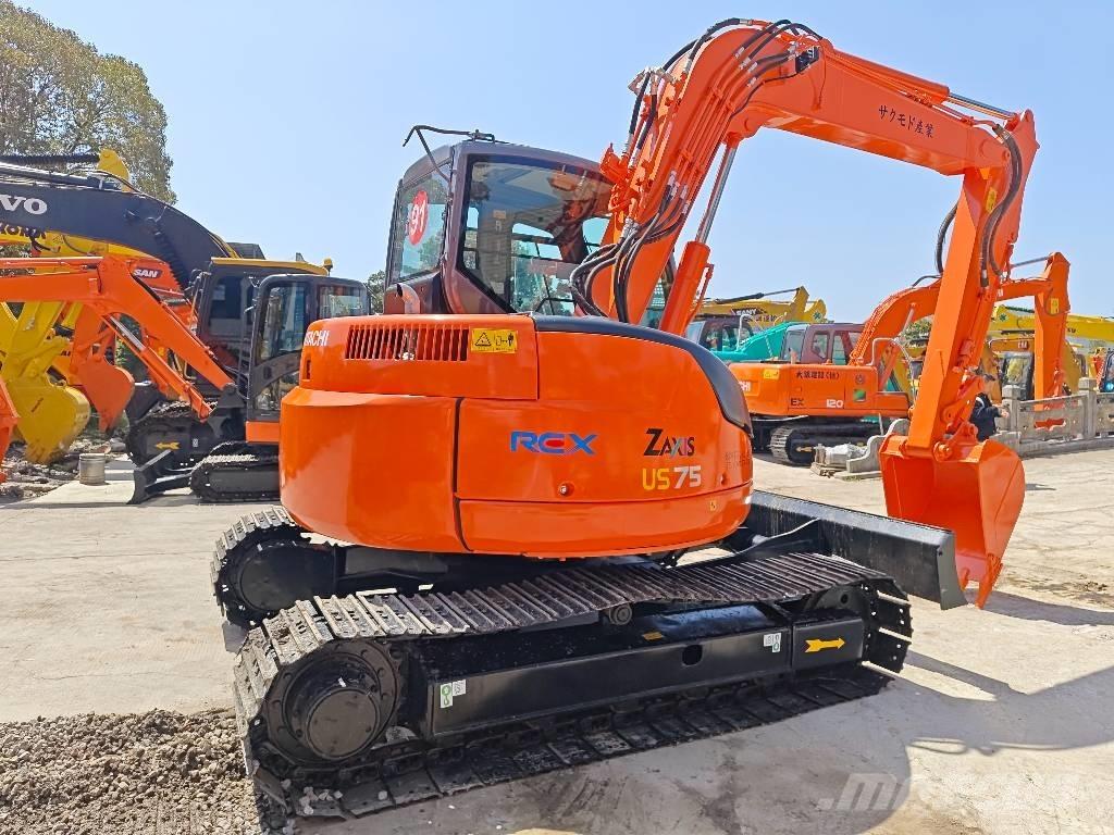 Hitachi ZX 75 US Середні екскаватори 7т. - 12т.