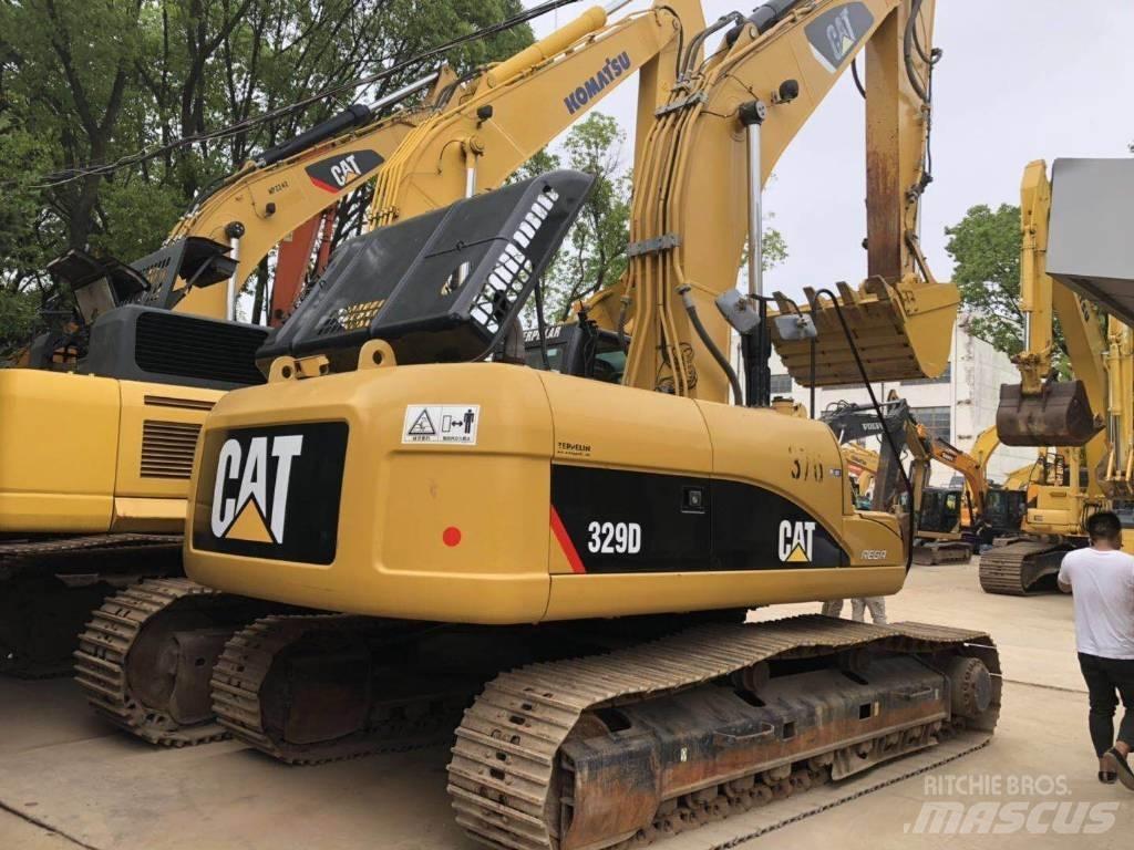 CAT 329 Гусеничні екскаватори