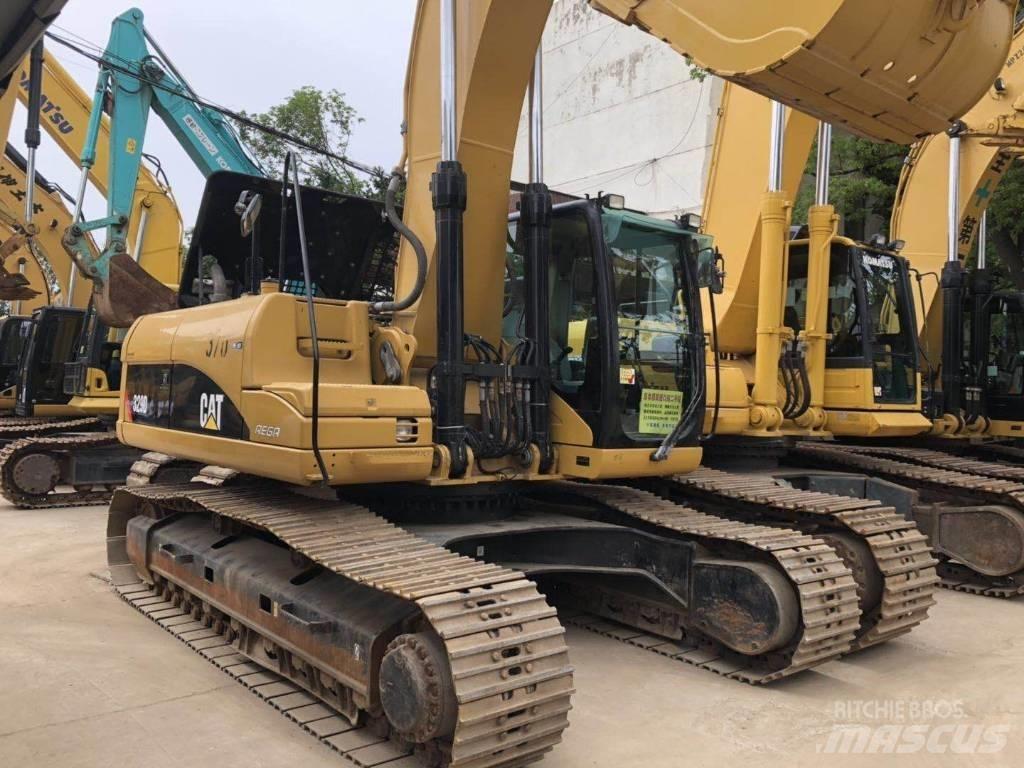 CAT 329 Гусеничні екскаватори