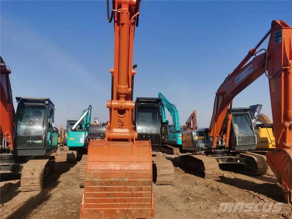 Hitachi ZX210 Гусеничні екскаватори
