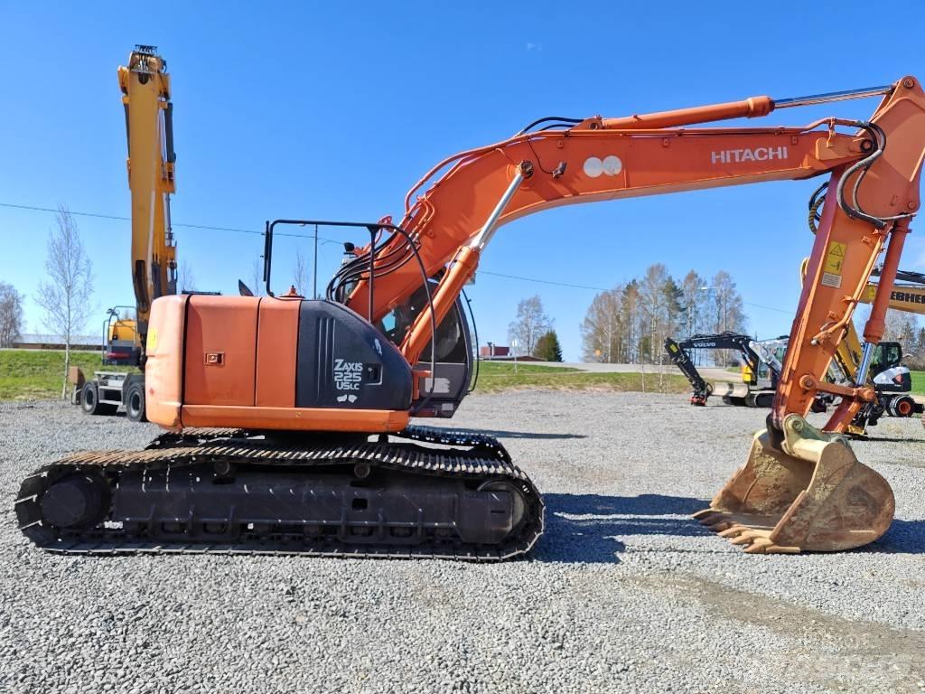 Hitachi ZX 225 US Гусеничні екскаватори