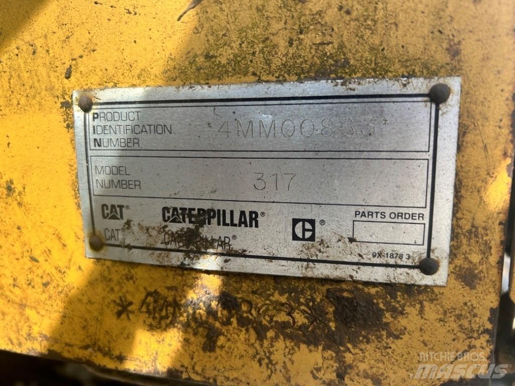 CAT 317 Гусеничні екскаватори