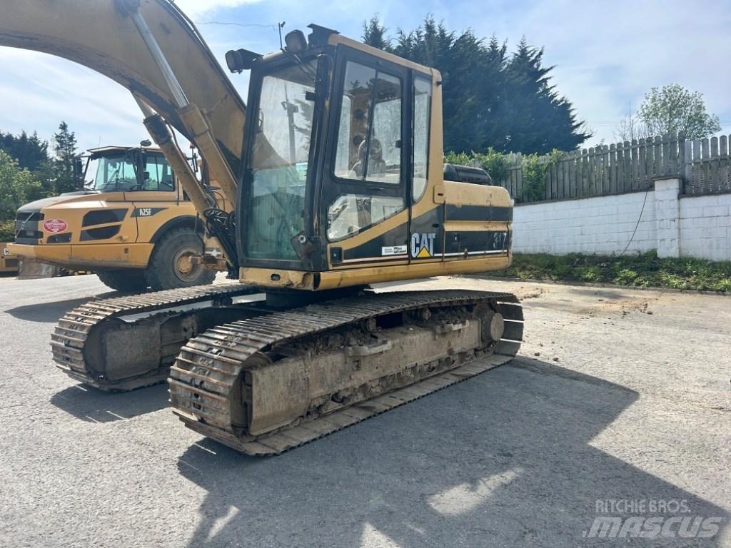 CAT 317 Гусеничні екскаватори