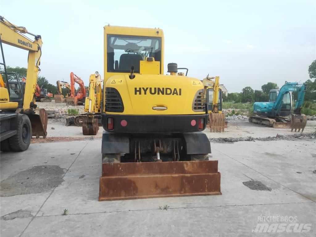 Hyundai R60W-7 Колісні екскаватори