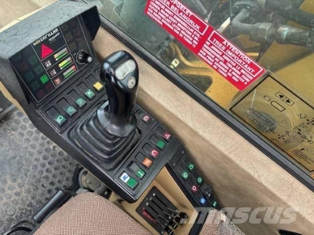 CAT M 315 Колісні екскаватори