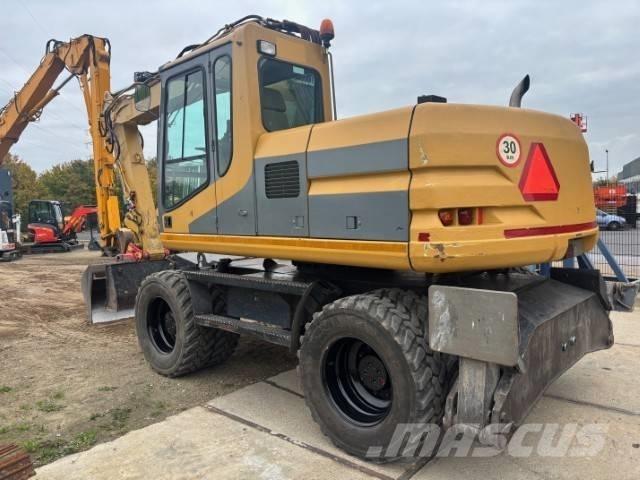 CAT M 315 Колісні екскаватори