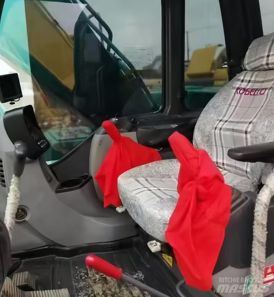 Kobelco SK 210 Гусеничні екскаватори
