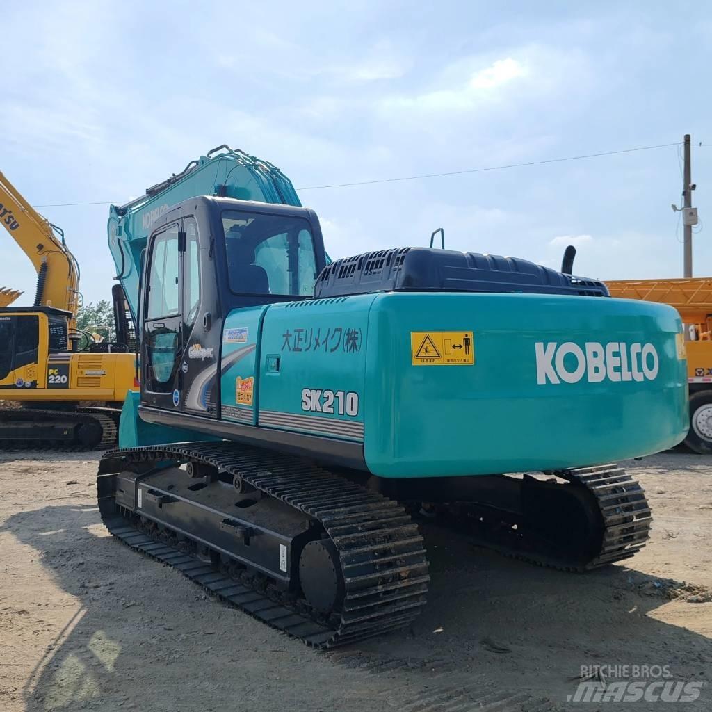 Kobelco SK 210 Гусеничні екскаватори