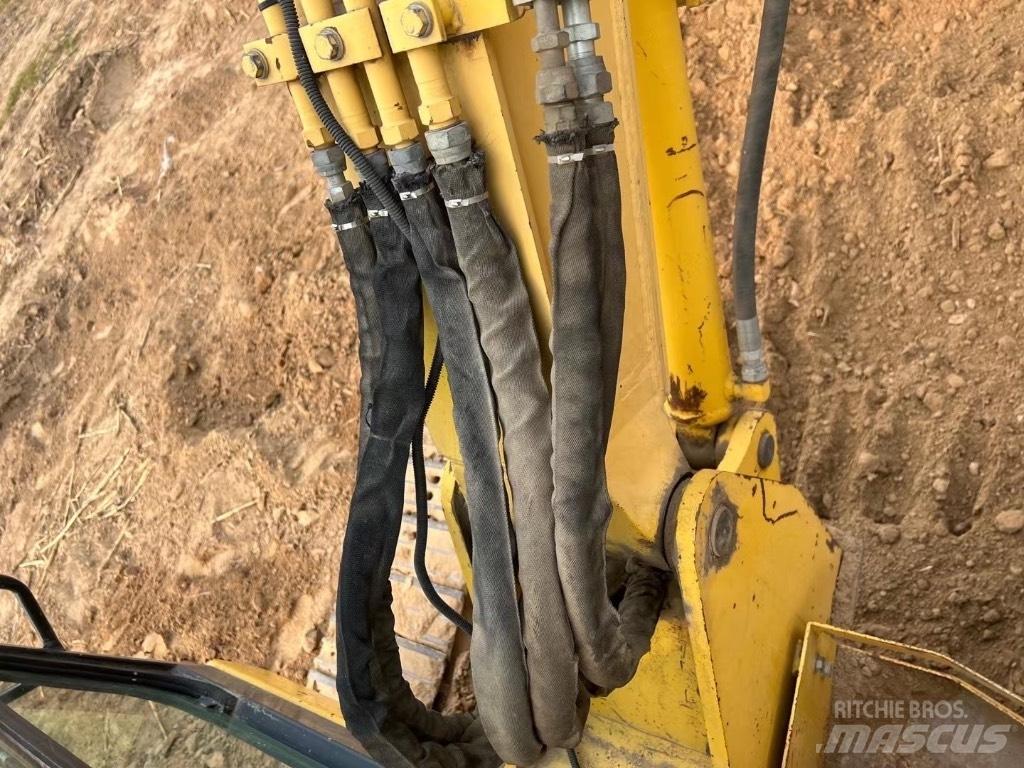 Komatsu PC58 Середні екскаватори 7т. - 12т.