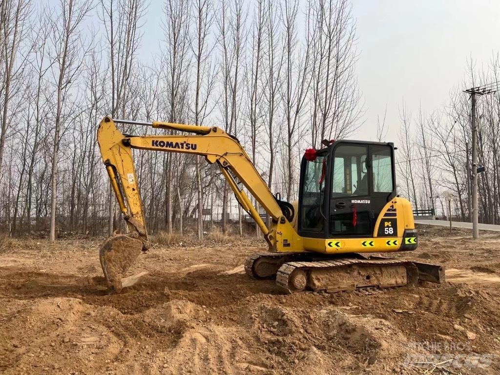 Komatsu PC58 Середні екскаватори 7т. - 12т.