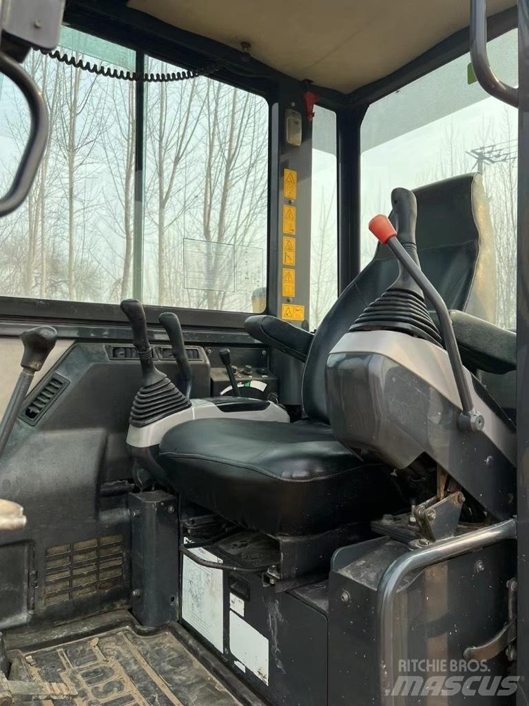 Komatsu PC58 Середні екскаватори 7т. - 12т.