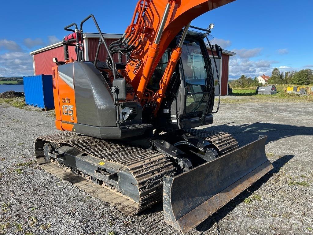 Hitachi ZX 135 US-7 Гусеничні екскаватори