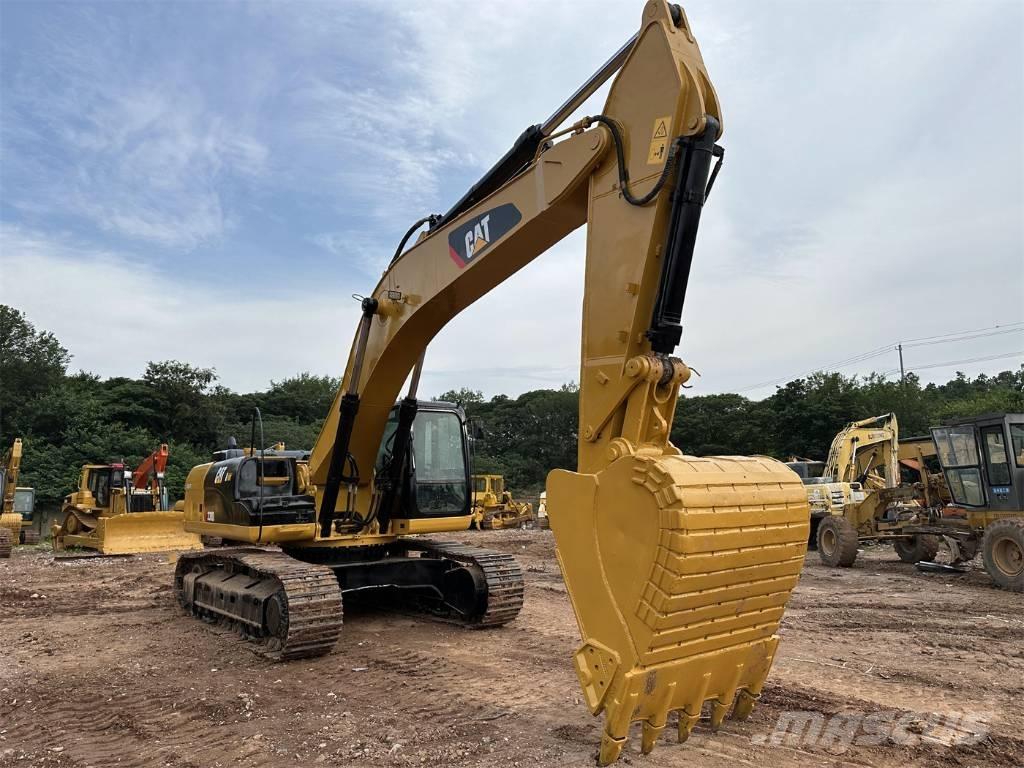 CAT 330DL Гусеничні екскаватори