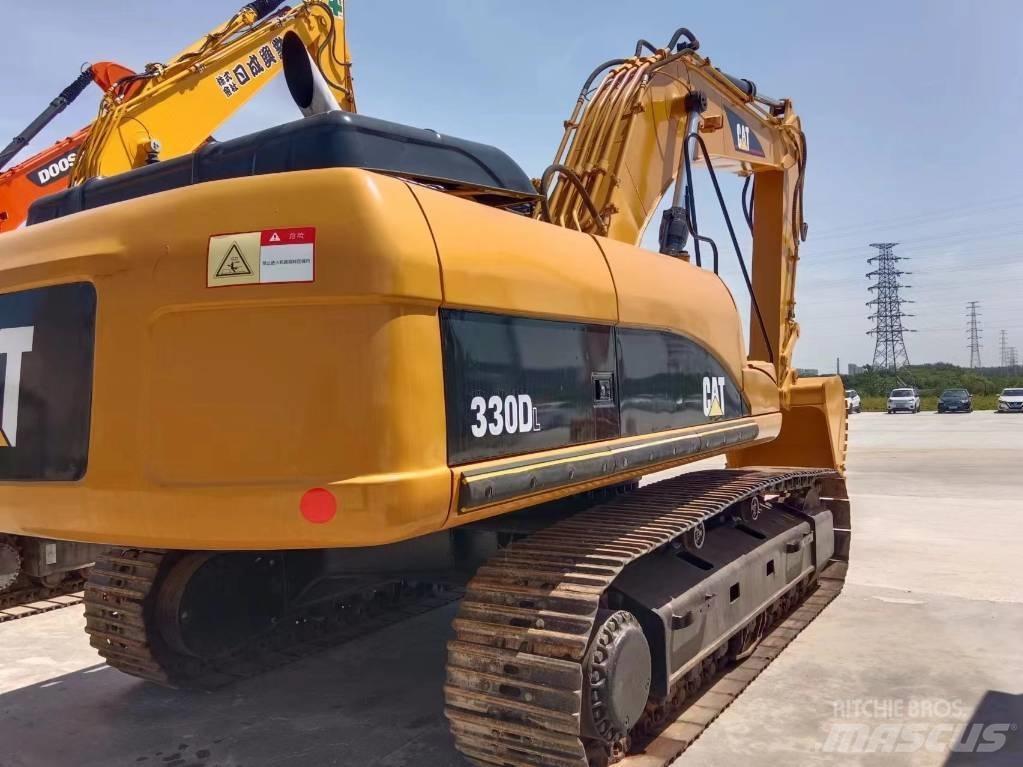 Cata-Dyne 330 Гусеничні екскаватори