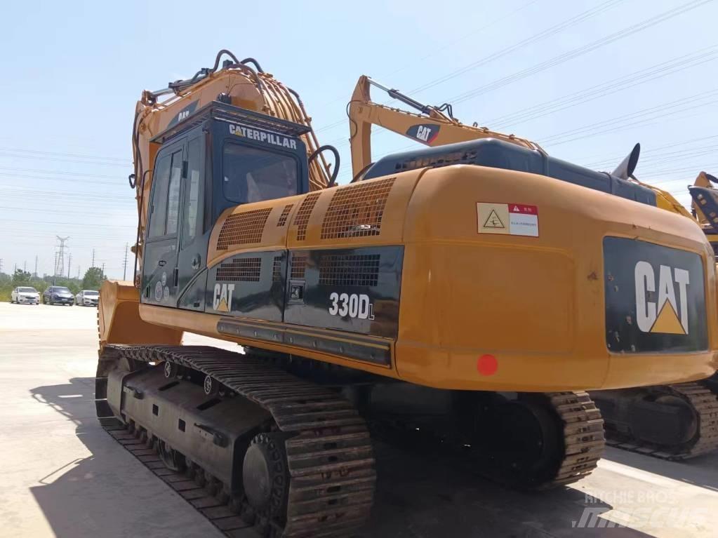 Cata-Dyne 330 Гусеничні екскаватори