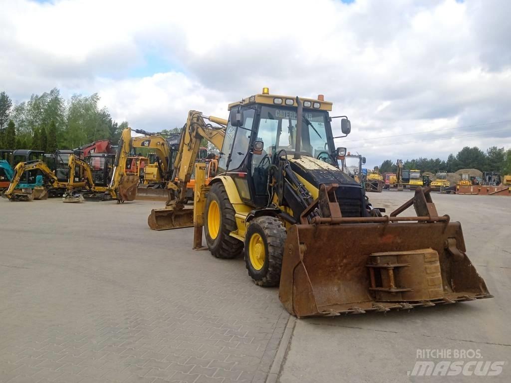 CAT 428 D Екскаватори-навантажувачі