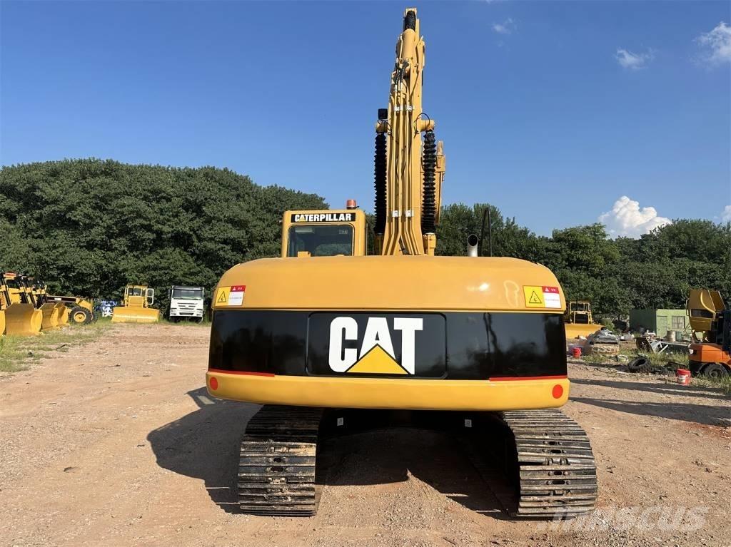 CAT 320 C Гусеничні екскаватори