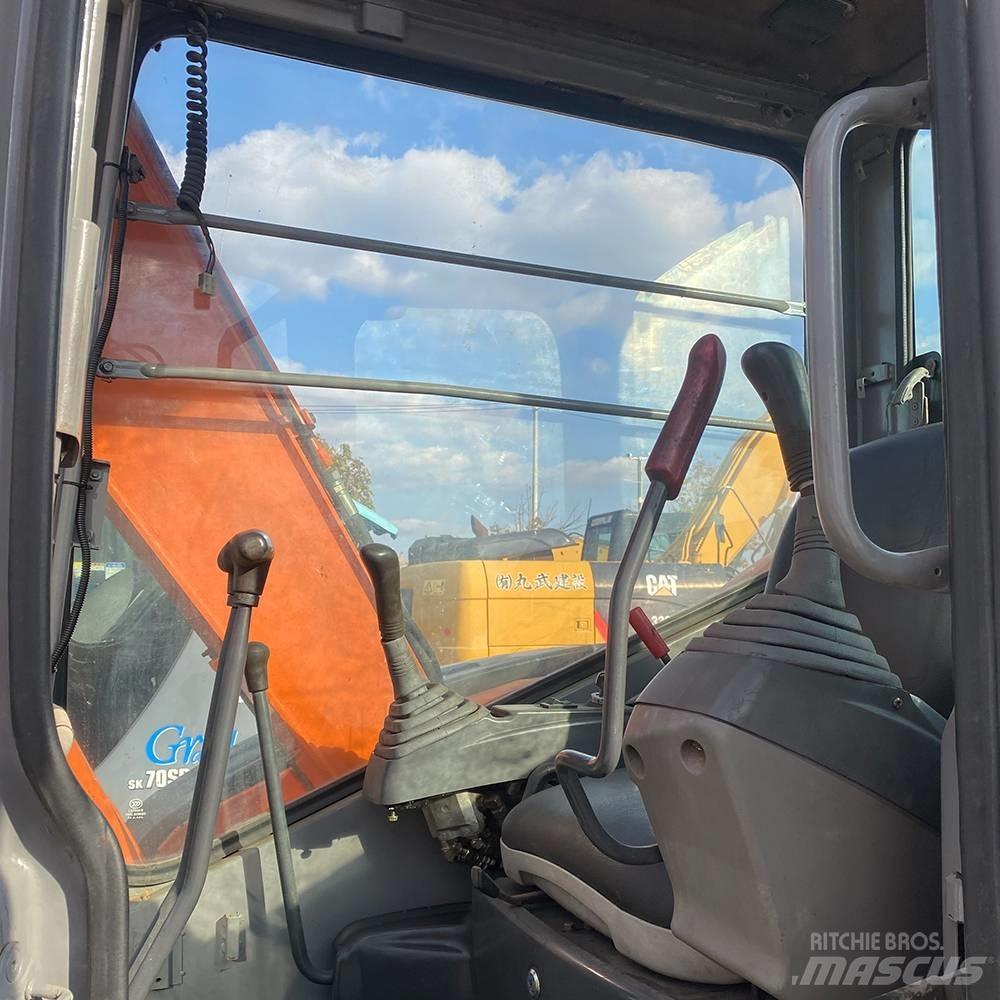 Hitachi ZX55 Гусеничні екскаватори