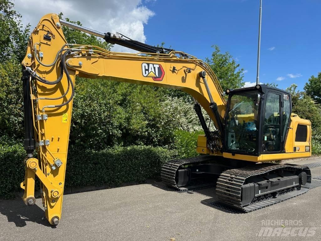 CAT 317 Гусеничні екскаватори