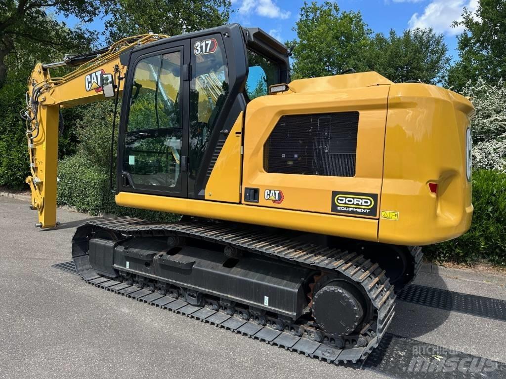 CAT 317 Гусеничні екскаватори