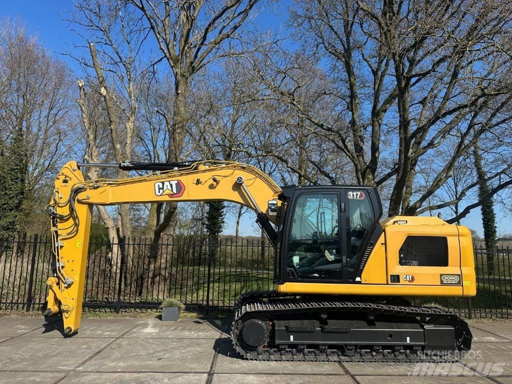 CAT 317 Гусеничні екскаватори