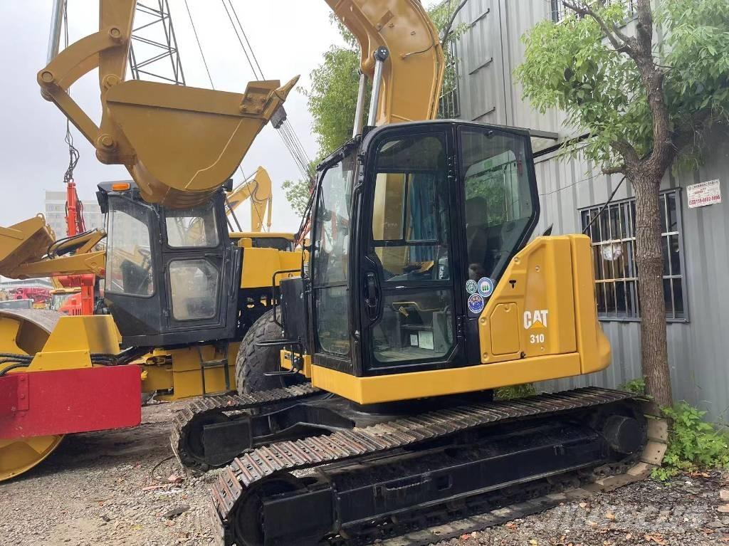 CAT 310 Гусеничні екскаватори