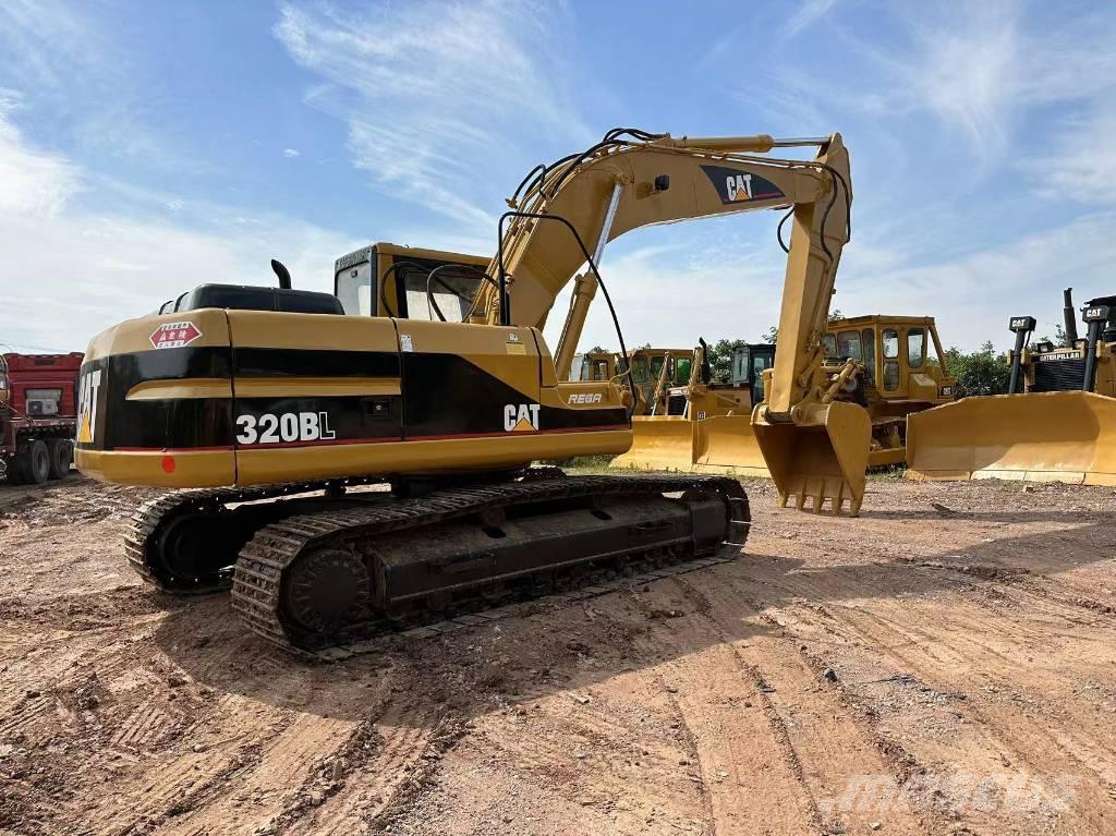 CAT 320BL Гусеничні екскаватори