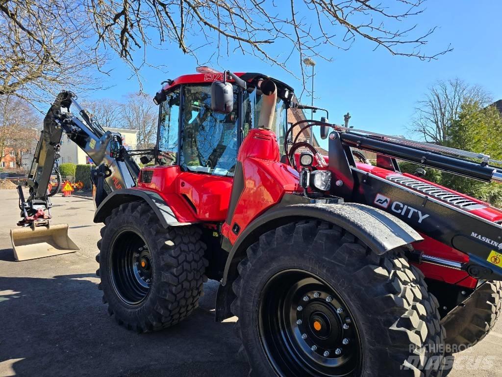 Huddig 1370 Екскаватори-навантажувачі