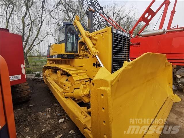 Komatsu D155A Гусеничні бульдозери