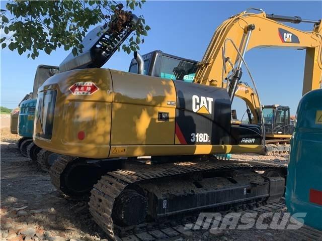 CAT 318DL Гусеничні екскаватори