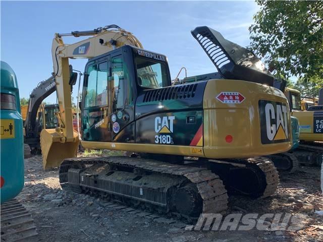 CAT 318DL Гусеничні екскаватори