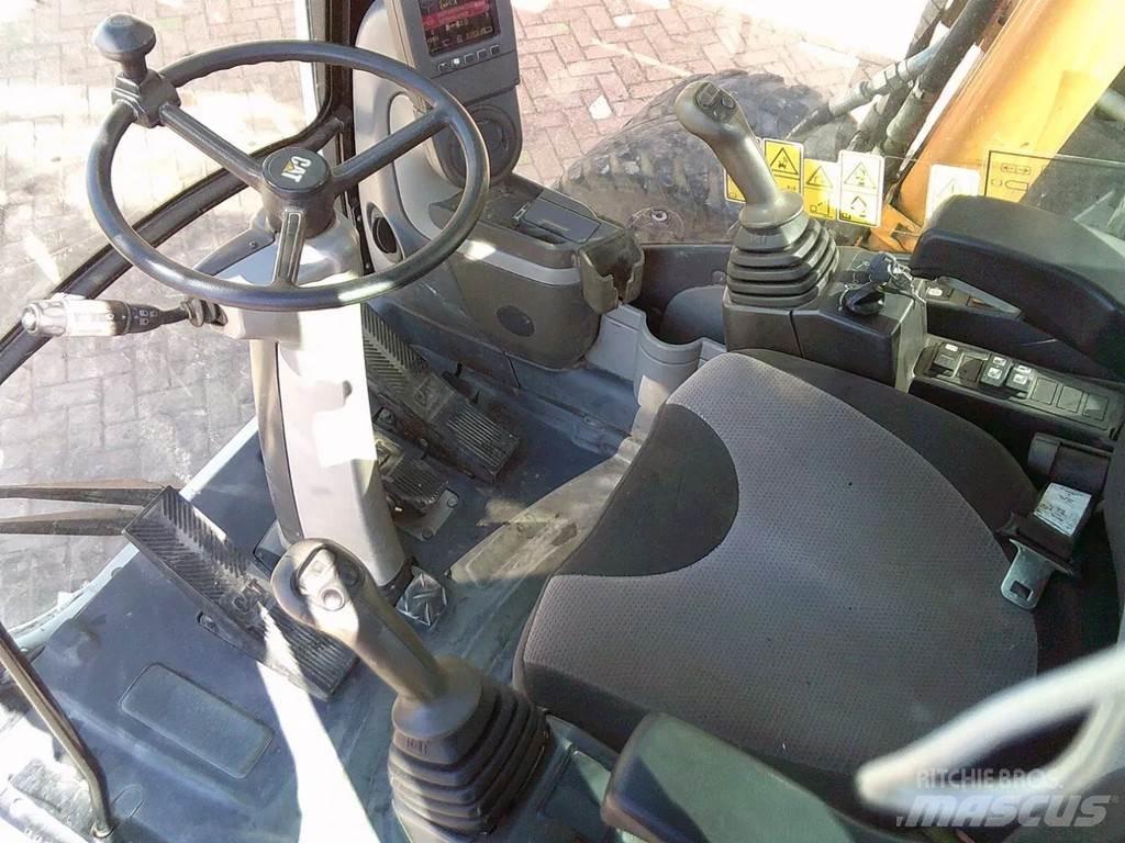 CAT M313D Колісні екскаватори