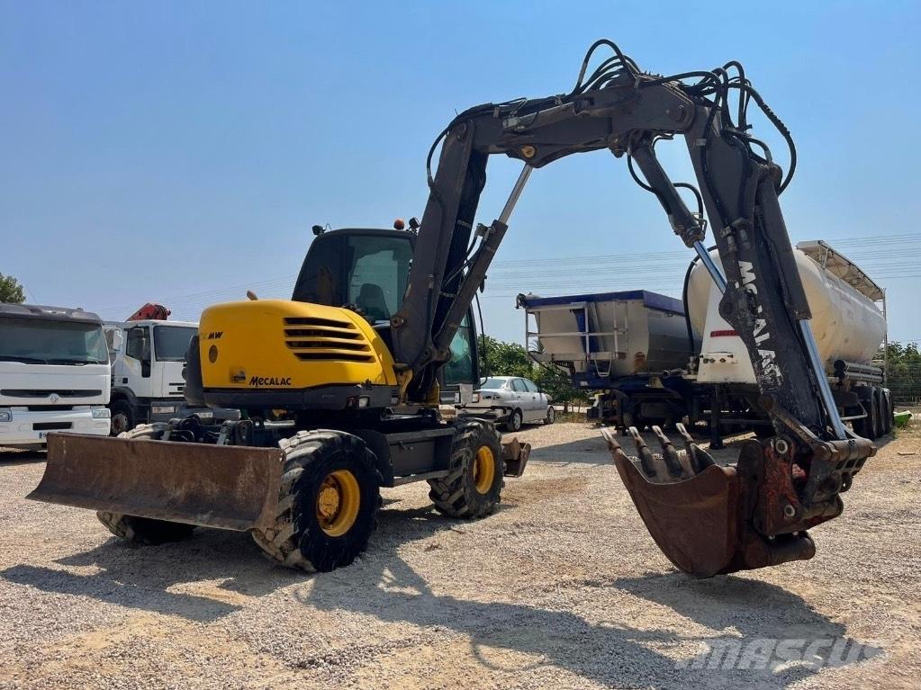 Mecalac 714 MW Колісні екскаватори
