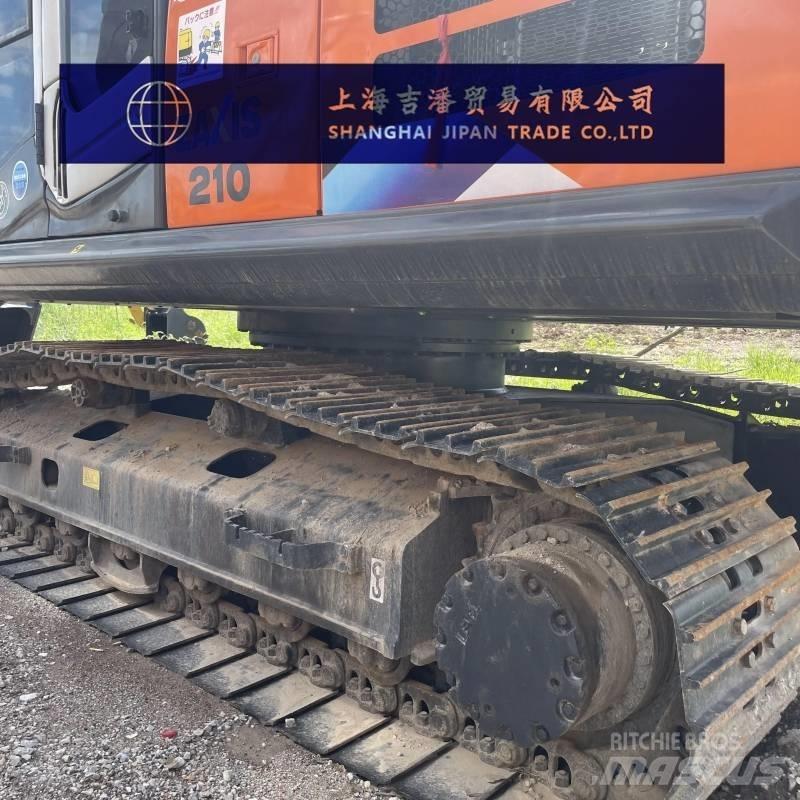 Hitachi ZX 210 Гусеничні екскаватори