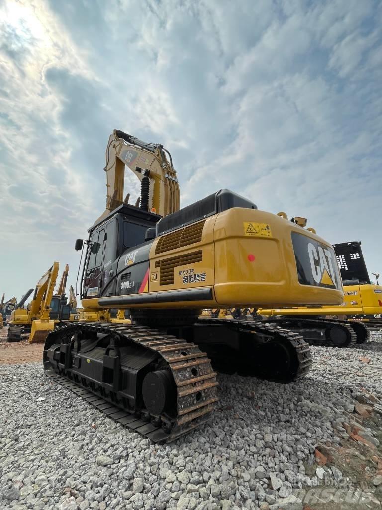 CAT 340 Гусеничні екскаватори