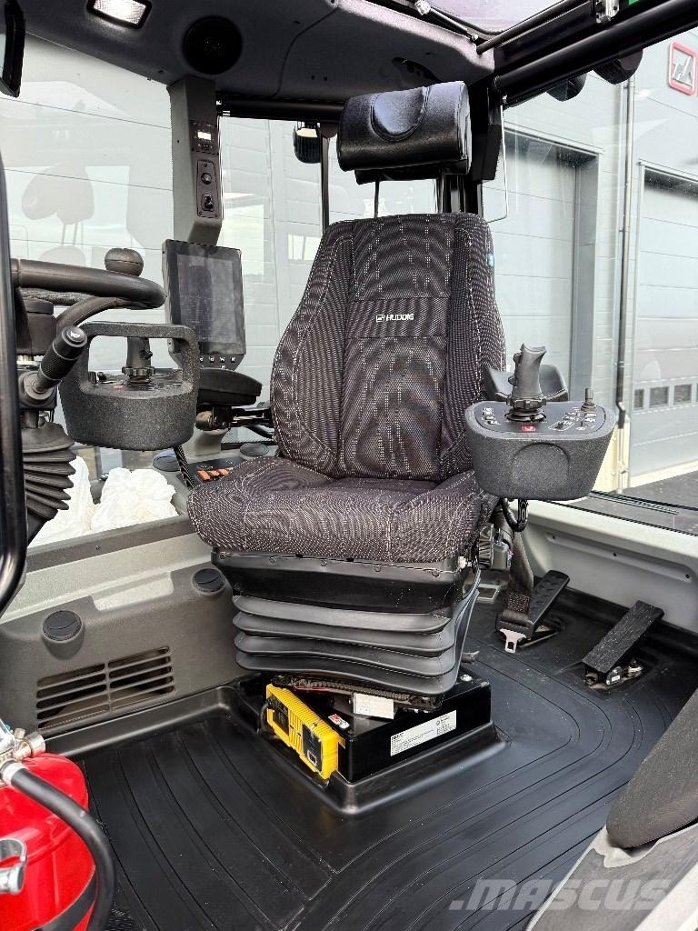 Huddig 1370 Екскаватори-навантажувачі