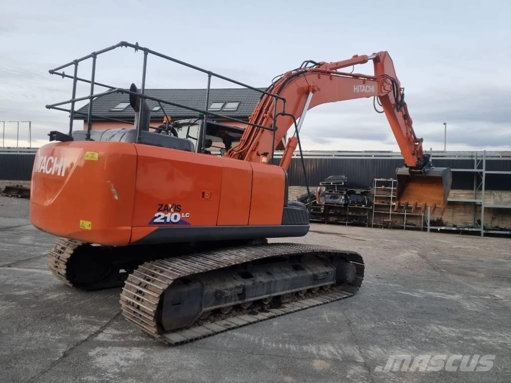 Hitachi 210 Гусеничні екскаватори