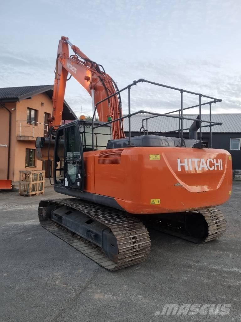 Hitachi 210 Гусеничні екскаватори