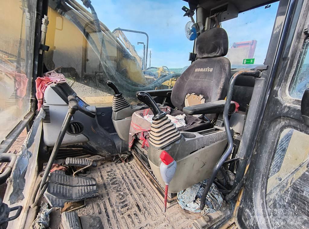 Komatsu 210 LC Гусеничні екскаватори