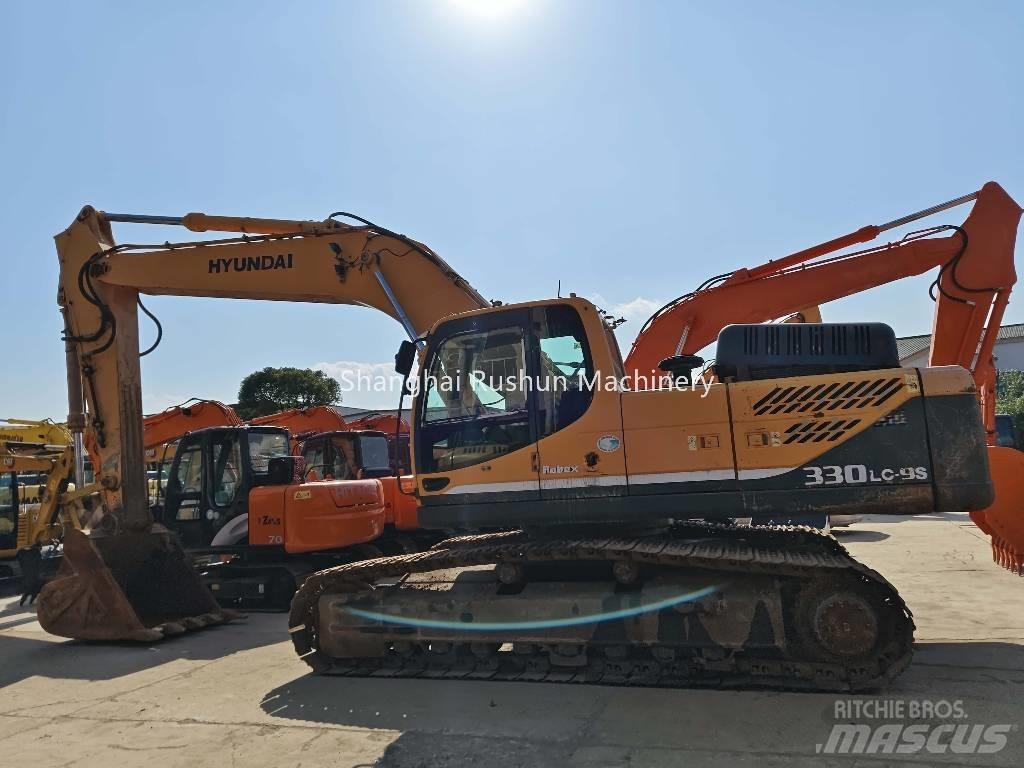 Hyundai 330 Гусеничні екскаватори