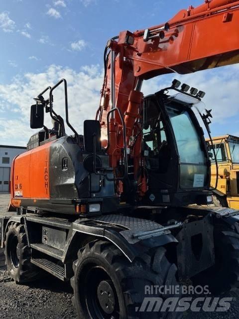 Hitachi ZX 140 W-6 Колісні екскаватори