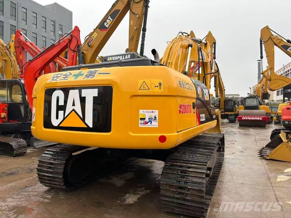 CAT 323 D Гусеничні екскаватори