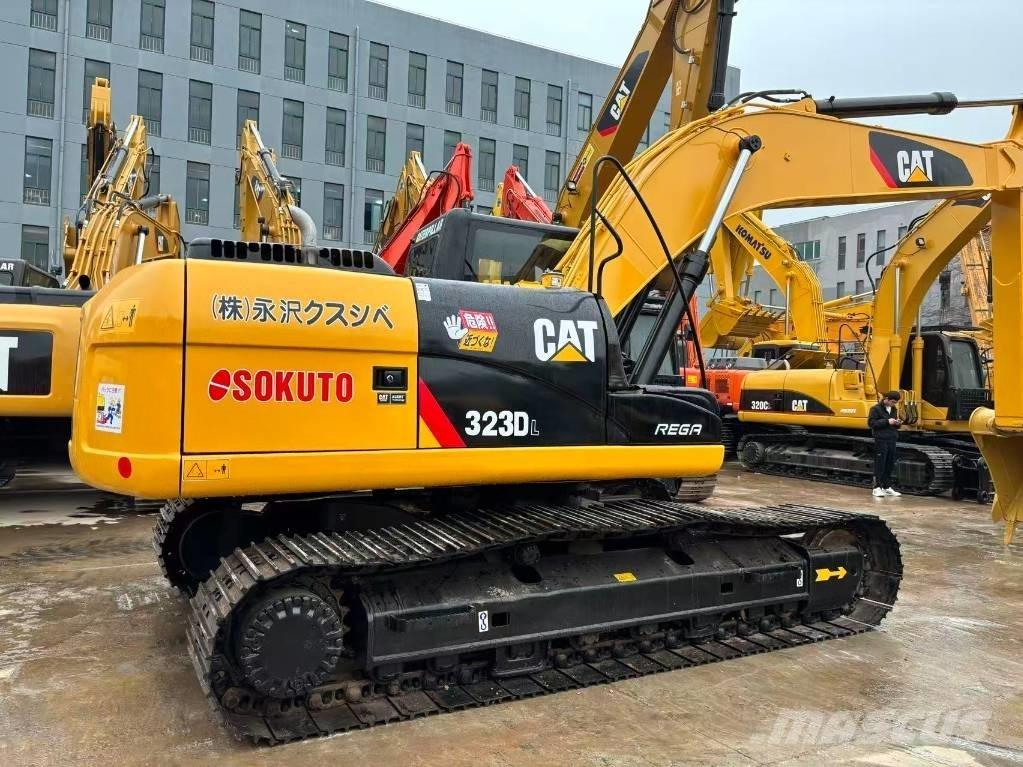 CAT 323 D Гусеничні екскаватори
