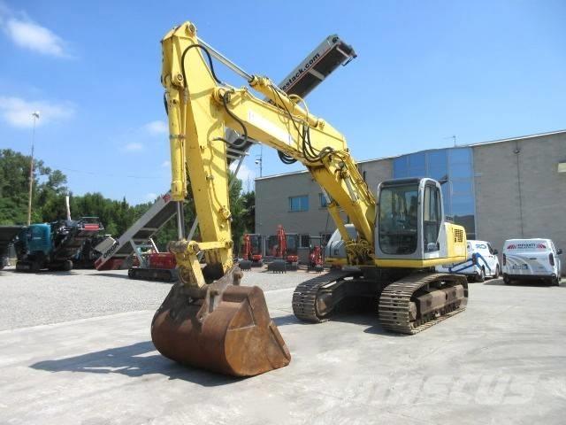 New Holland E 245 Гусеничні екскаватори