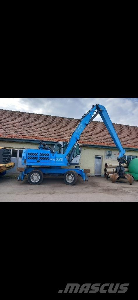 Fuchs MHL 320 Колісні екскаватори