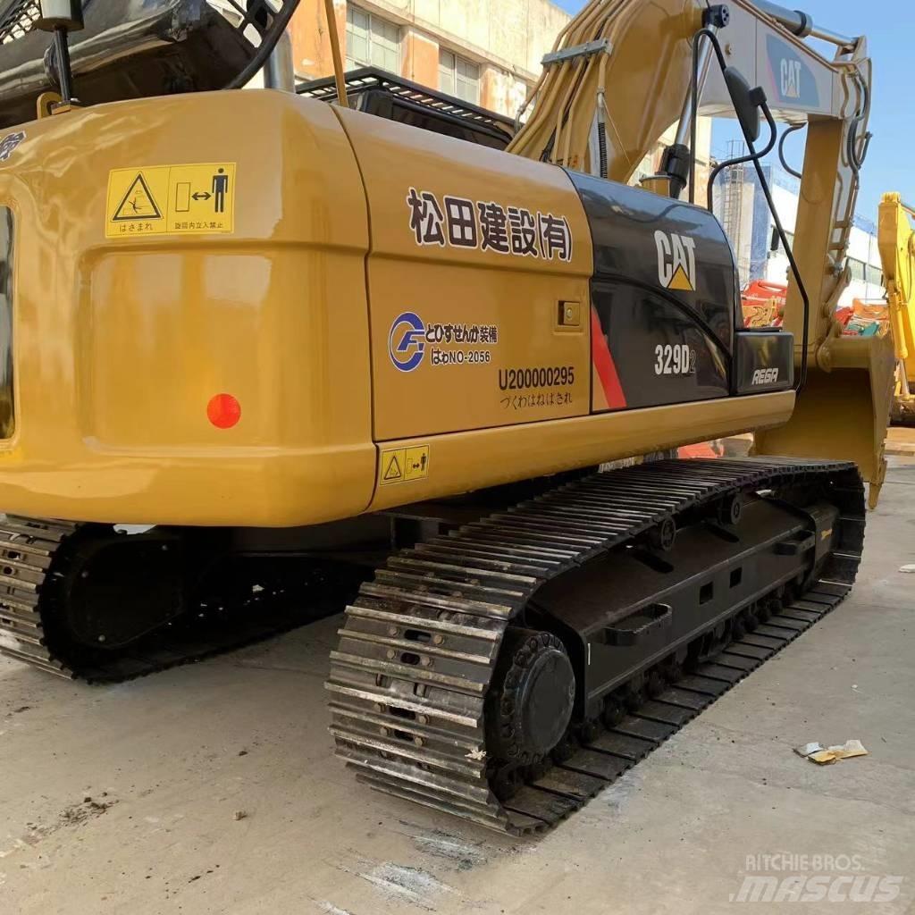 CAT 329E Гусеничні екскаватори