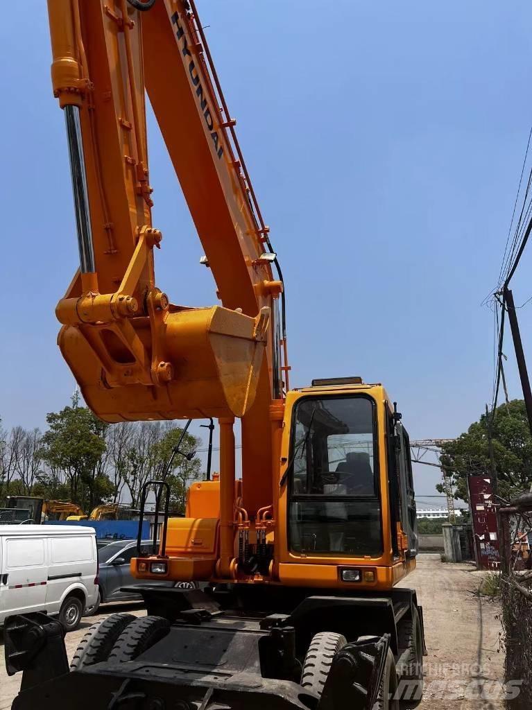 Hyundai 210W-7 Колісні екскаватори